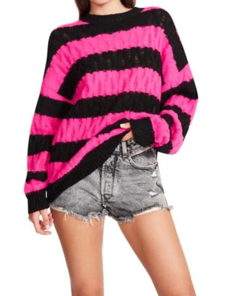 Front of a model wearing a size Large Karli Sweater in Pink Glow in Pink Glow by STEVE MADDEN. | dia_product_style_image_id:346271